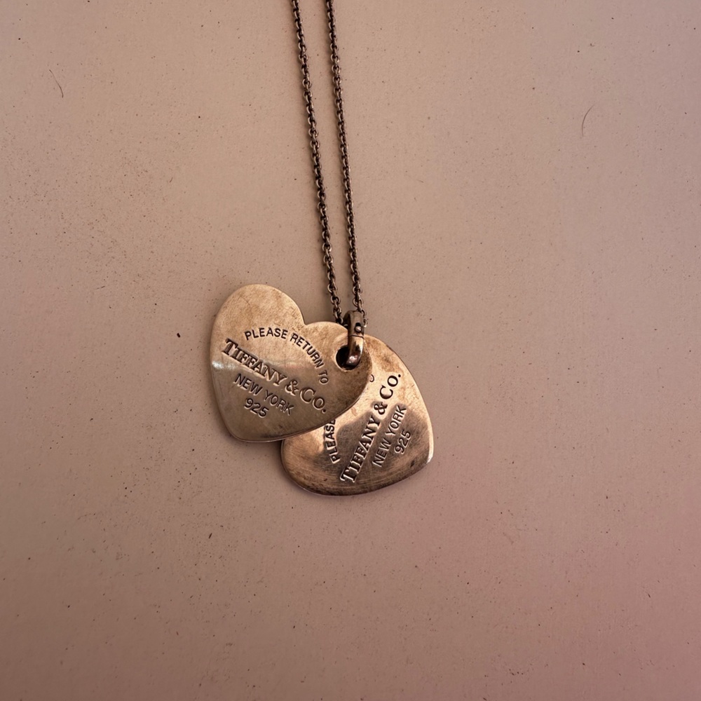 Beautiful Authentic Tiffany necklace and heart charms.